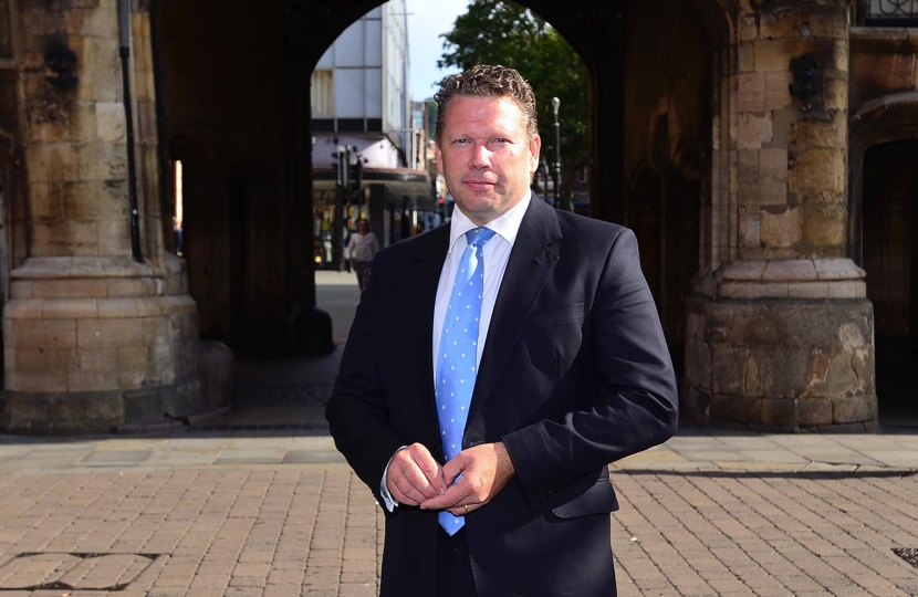 Karl in front of Stonebow in Lincoln